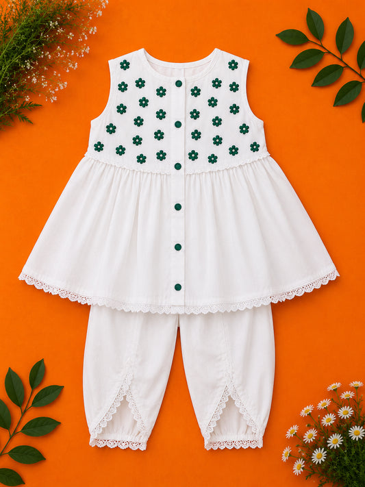 Girls white cotton co-ord set with green floral embellishments and tulip trousers by Baby Bee Boutique