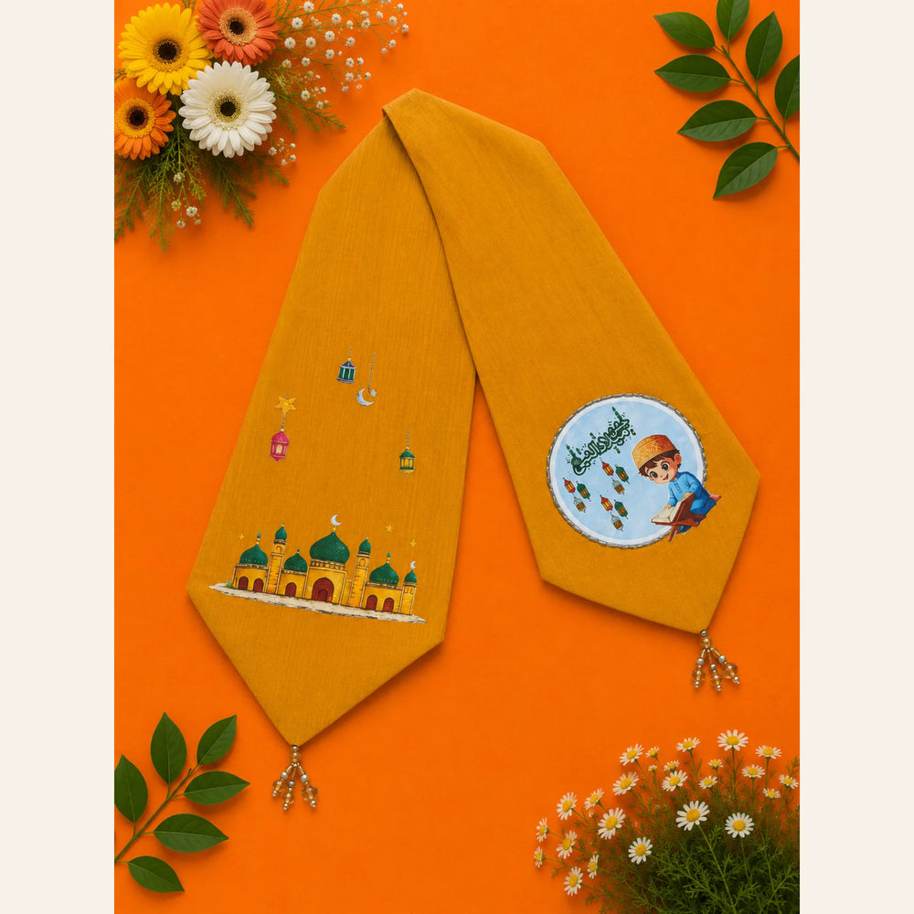 Mustard gold kids decorative muffler featuring Masjid-e-Nabawi, lanterns, Quran reading illustration and Islamic artwork from Baby Bee Boutique's Rabi ul Awal Edit '26.