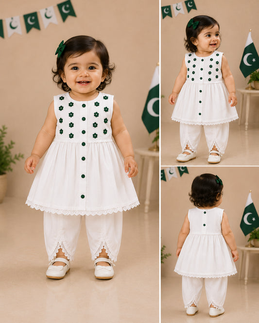 Girls white cotton co-ord set with green floral embellishments and tulip trousers by Baby Bee Boutique