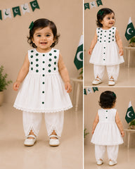 Girls white cotton co-ord set with green floral embellishments and tulip trousers by Baby Bee Boutique