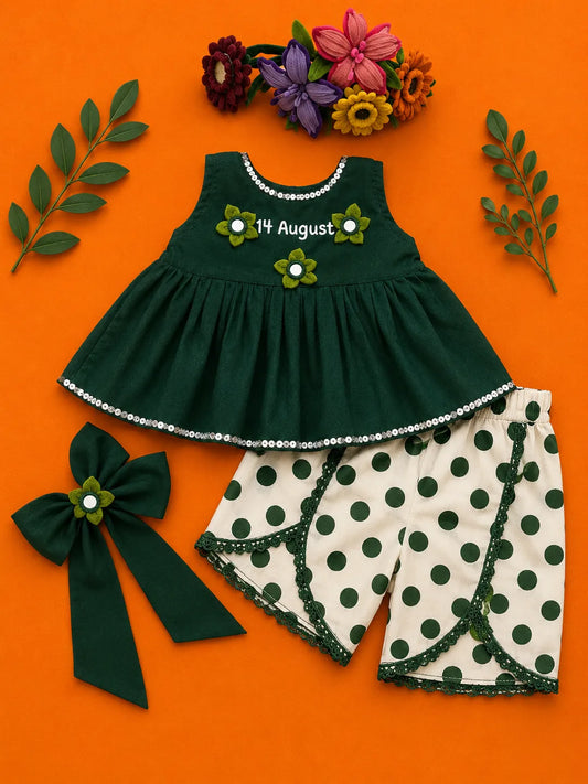 Girls green peplum top with white green polka dot tulip pants and matching bow by Baby Bee Boutique